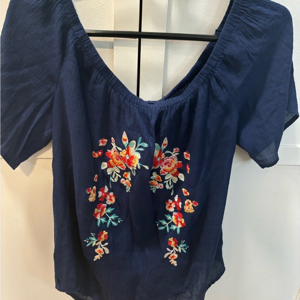 E and M off the shoulders navy shirt with flower embroidery.